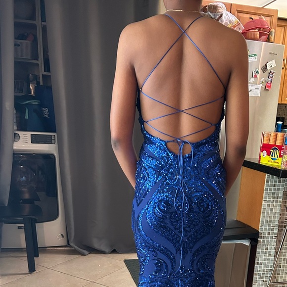 Sequin prom gown worn for prom. Size xs long flowing sequin royal blue gown $300 - Picture 3 of 4